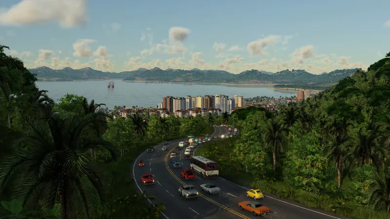 A curving road and coastal city in Transport Fever 3